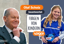 Olaf Scholz bei Logo