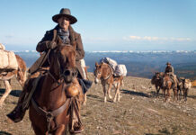 Kevin Costner auf einem Pferd